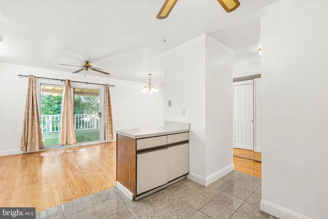 643 Saint Anthony Ln, Upper Darby, PA 19082 - kitchen with ceiling fan, baseboards, and granite floors