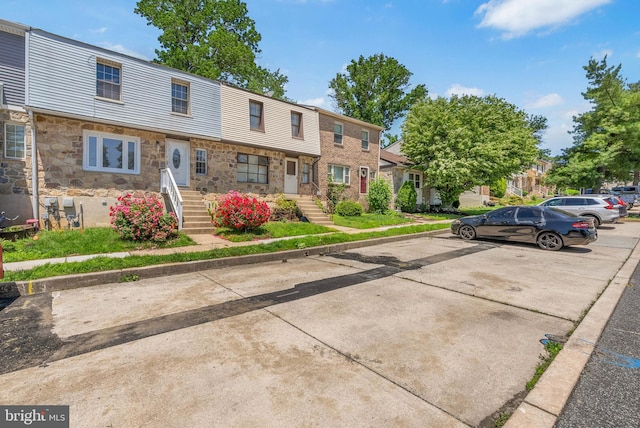 643 Saint Anthony Ln, Upper Darby, PA 19082 - view of property featuring uncovered parking and stone siding
