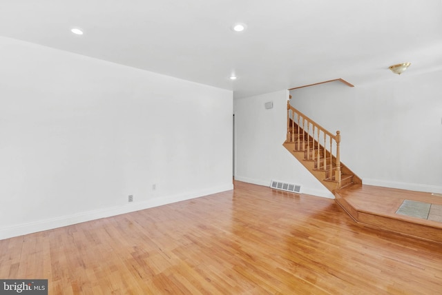 643 Saint Anthony Ln, Upper Darby, PA 19082 - unfurnished living room featuring stairs, wood finished floors, recessed lighting, and baseboards