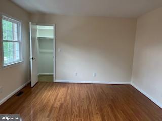 13 E Cliff St, Alexandria, VA 22301 - unfurnished bedroom featuring wood finished floors and baseboards