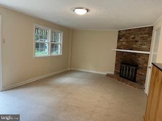 13 E Cliff St, Alexandria, VA 22301 - unfurnished living room with a fireplace and baseboards