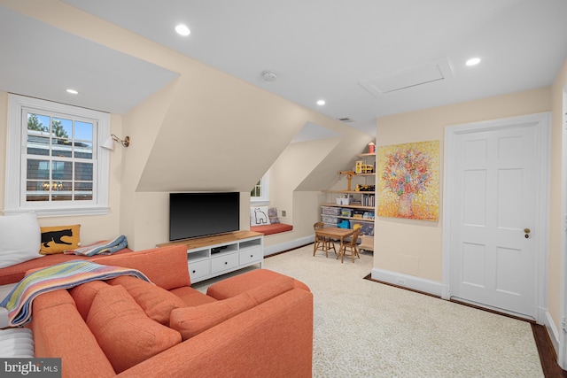 living area featuring baseboards, attic access, carpet, and recessed lighting
