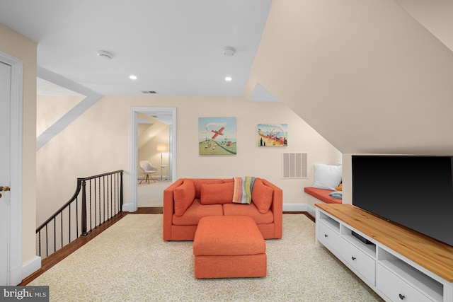 living area with recessed lighting and baseboards