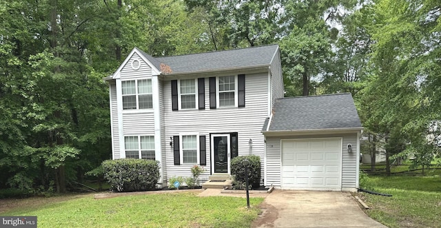 4120 Lancaster Cir, Waldorf, MD 20603 - view of front of house featuring a garage, driveway, a front lawn, and a shingled roof