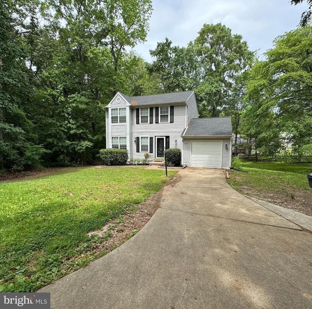 4120 Lancaster Cir, Waldorf, MD 20603 - colonial inspired home featuring driveway, an attached garage, and a front yard