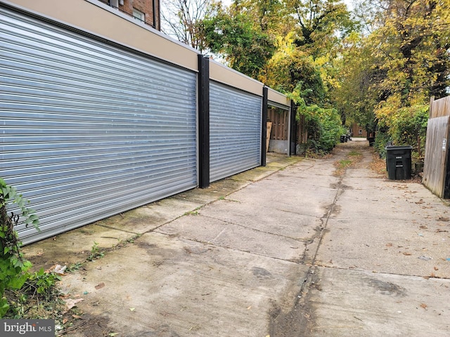 view of property exterior with fence