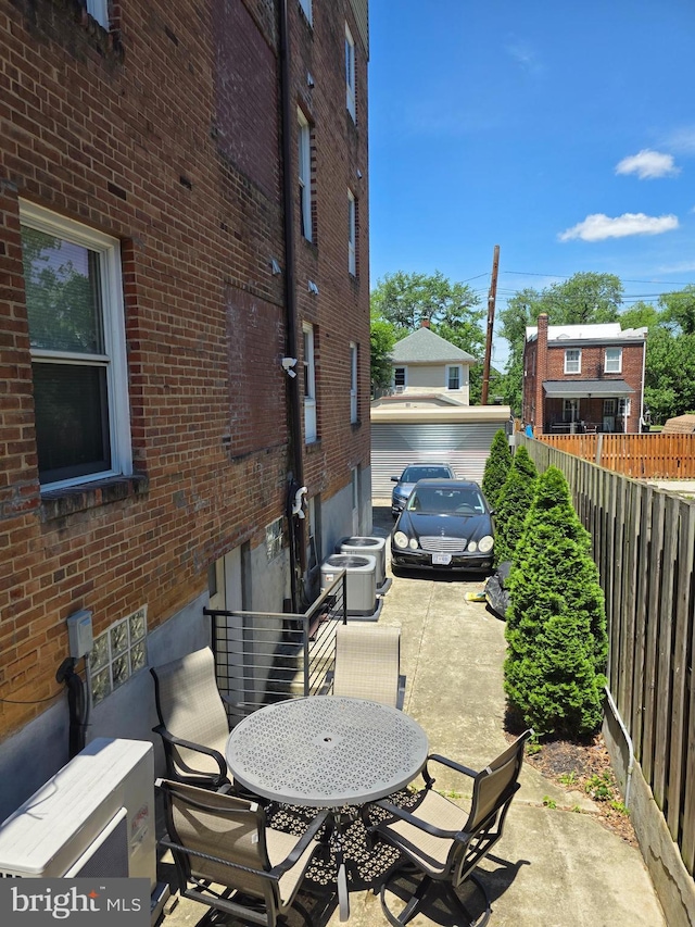 4106 Gault Pl NE Unit 5, Washington, DC 20019 - view of patio / terrace featuring outdoor dining area and central air condition unit