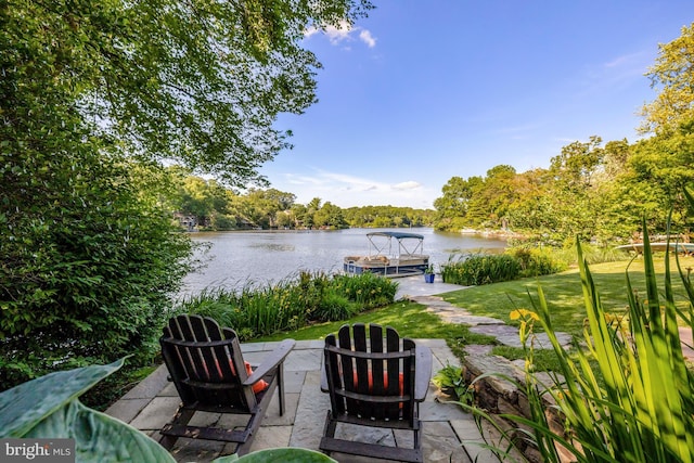 2200 Spinnaker Ct, Reston, VA 20191 - view of patio featuring a fire pit, a water view, and a dock