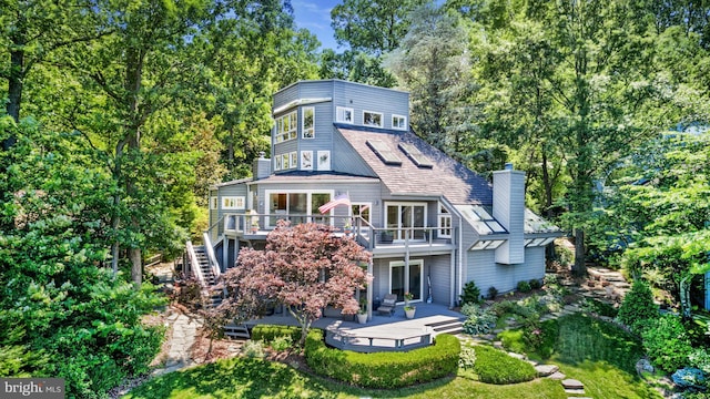 2200 Spinnaker Ct, Reston, VA 20191 - back of property featuring a deck, a chimney, a patio, and stairway