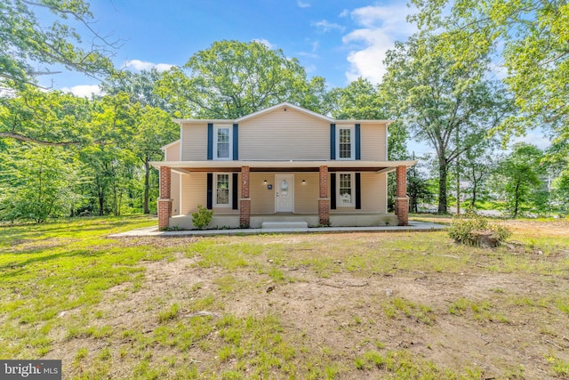 21 Mattingly Ave, Indian Head, MD 20640 - view of front facade featuring covered porch and brick siding