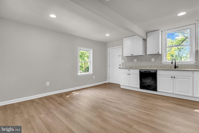 21 Mattingly Ave, Indian Head, MD 20640 - kitchen featuring dishwasher, light wood-style floors, light stone countertops, baseboards, and a sink