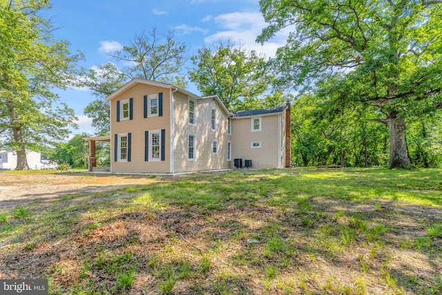 21 Mattingly Ave, Indian Head, MD 20640 - rear view of property with a chimney and cooling unit