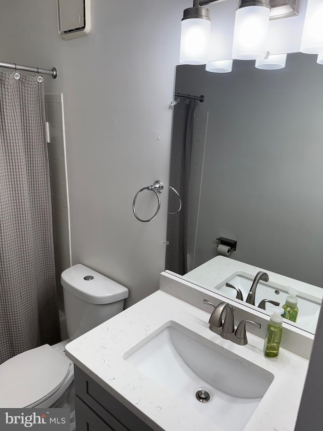 14059 Vista Dr Unit 140, Laurel, MD 20707 - full bathroom with vanity, toilet, and curtained shower