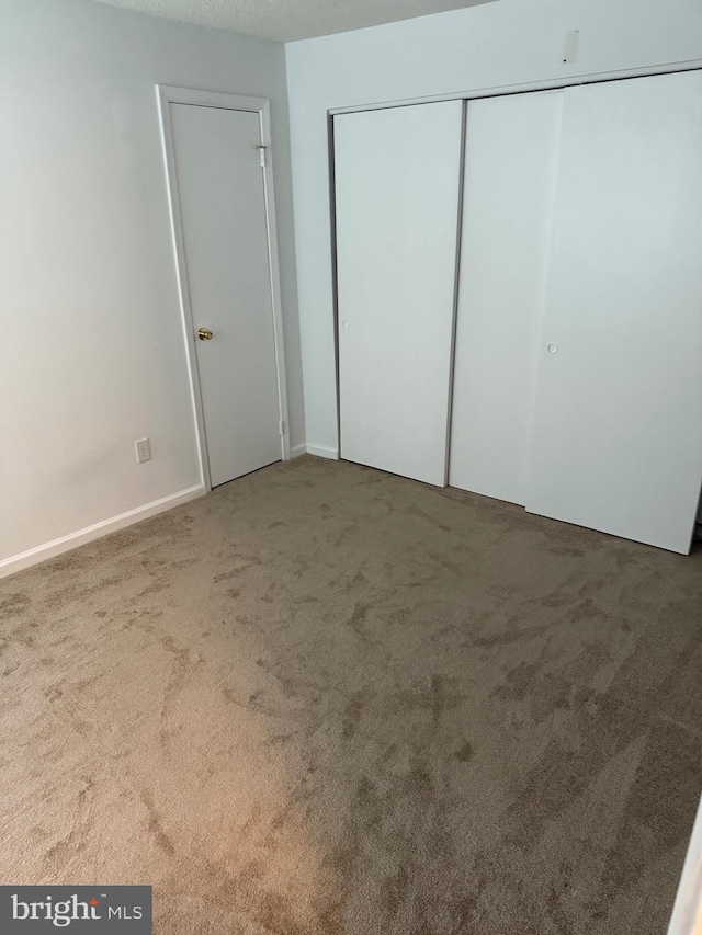 14059 Vista Dr Unit 140, Laurel, MD 20707 - unfurnished bedroom featuring carpet and a closet