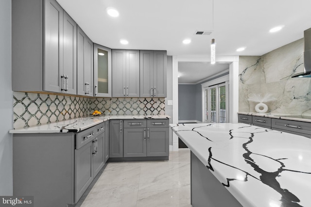 616 Webb Rd, Elkins Park, PA 19027 - kitchen with gray cabinets, light marble finish flooring, recessed lighting, glass insert cabinets, and backsplash