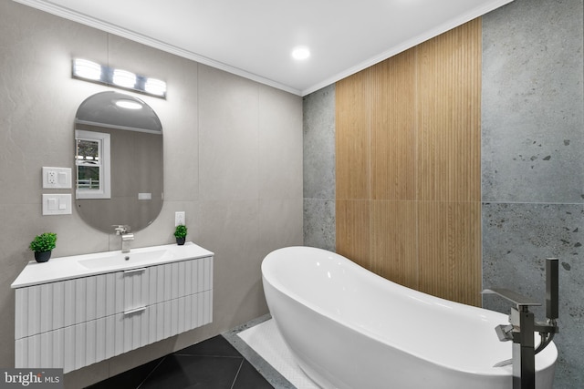 616 Webb Rd, Elkins Park, PA 19027 - full bath featuring a freestanding bath, ornamental molding, vanity, tile walls, and tile patterned flooring
