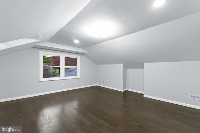 616 Webb Rd, Elkins Park, PA 19027 - bonus room featuring baseboards, dark wood-style floors, and lofted ceiling