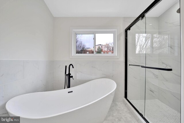 8120 Eastern Ave NW, Washington, DC 20012 - full bathroom with a stall shower, tile walls, and a soaking tub