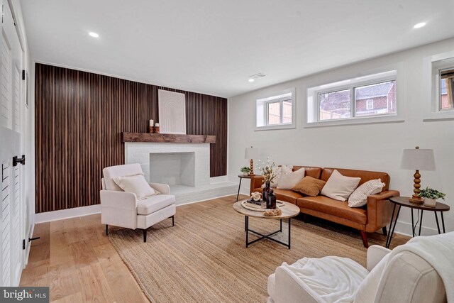 8120 Eastern Ave NW, Washington, DC 20012 - living area with light wood-style flooring, a fireplace, and recessed lighting