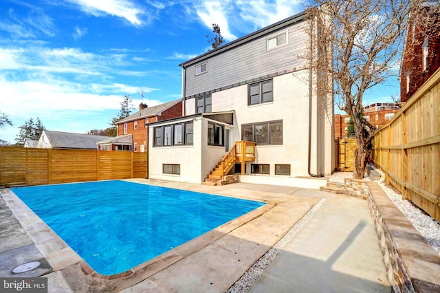 8120 Eastern Ave NW, Washington, DC 20012 - rear view of house featuring a fenced backyard and a patio