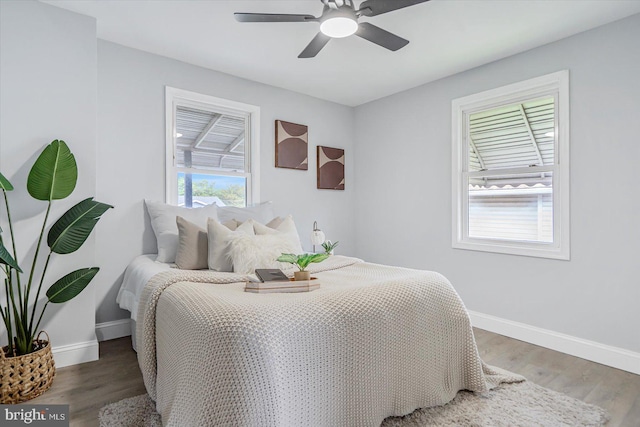 1711 Langley Rd, Baltimore, MD 21221 - bedroom with baseboards, wood finished floors, and ceiling fan