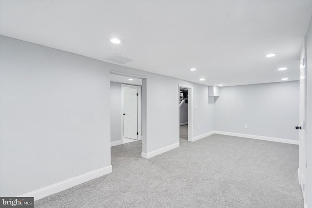 1711 Langley Rd, Baltimore, MD 21221 - finished basement featuring carpet flooring, recessed lighting, and baseboards