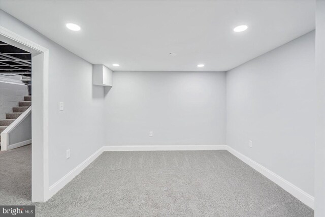 1711 Langley Rd, Baltimore, MD 21221 - finished below grade area with carpet floors, recessed lighting, stairs, and baseboards