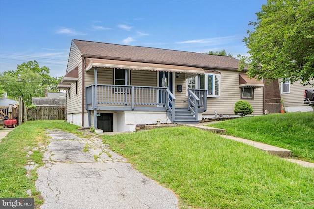 1711 Langley Rd, Baltimore, MD 21221 - view of front of house with covered porch and driveway