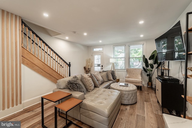 1919 Bennett Pl NE, Washington, DC 20002 - living room featuring stairs, hardwood / wood-style flooring, recessed lighting, and baseboards