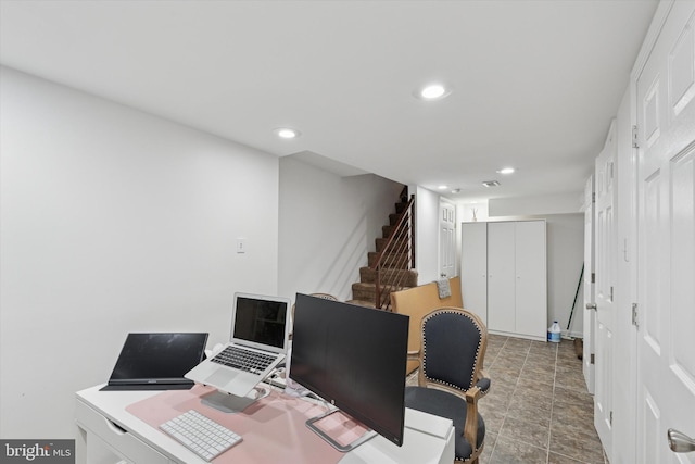 office space featuring recessed lighting