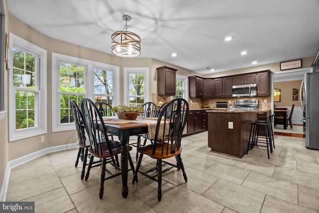 121 Beech Dr, Hatboro, PA 19040 - dining space with healthy amount of natural light, a chandelier, recessed lighting, and baseboards