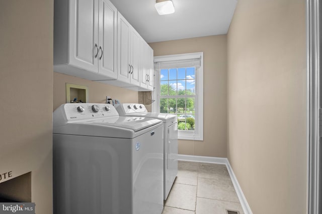121 Beech Dr, Hatboro, PA 19040 - clothes washing area featuring cabinet space, washer and clothes dryer, baseboards, and light tile patterned floors