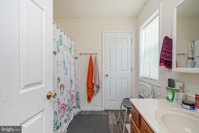 33 Laurel Rd, Millville, NJ 08332 - full bath with wood finished floors, vanity, and baseboards
