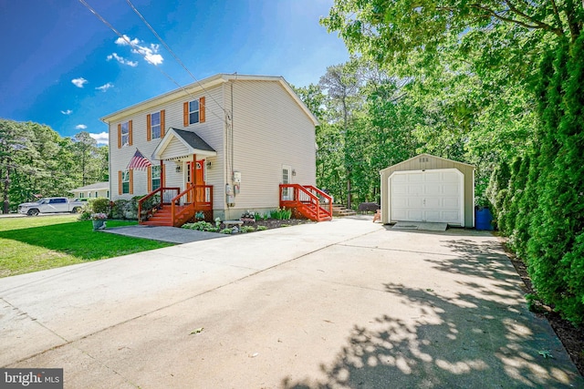 33 Laurel Rd, Millville, NJ 08332 - view of front of house with an outdoor structure, a garage, driveway, and a front lawn