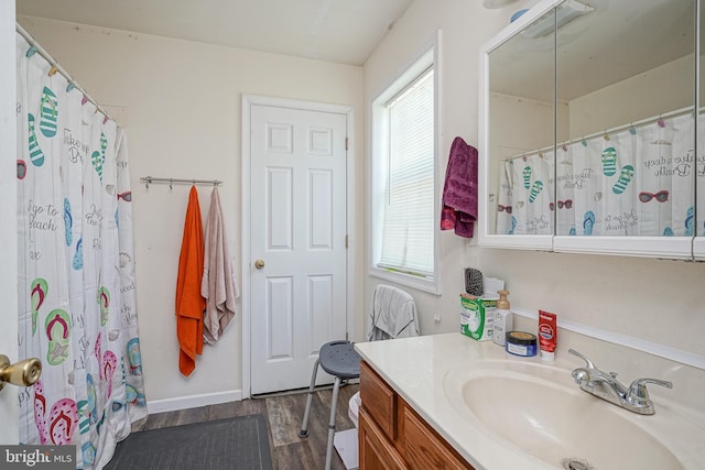 33 Laurel Rd, Millville, NJ 08332 - bathroom with wood finished floors, vanity, curtained shower, and baseboards