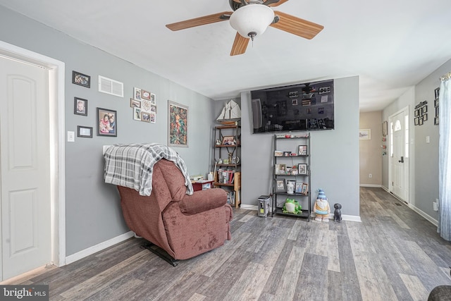 33 Laurel Rd, Millville, NJ 08332 - living area with wood finished floors, a ceiling fan, and baseboards