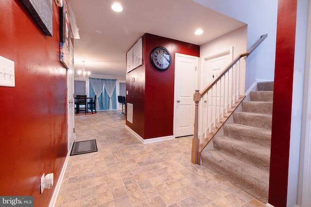 1722 Bradley Dr, Harrisburg, PA 17110 - entrance foyer with stairway, a chandelier, baseboards, recessed lighting, and stone finish flooring