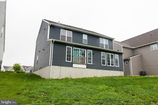 1722 Bradley Dr, Harrisburg, PA 17110 - back of house featuring cooling unit and a yard