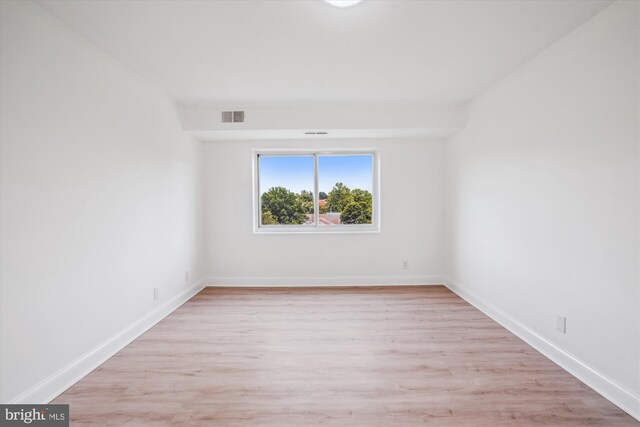 12001 Old Columbia Pike Unit 514, Silver Spring, MD 20904 - spare room featuring light wood finished floors and baseboards