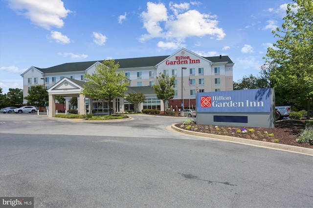 12001 Old Columbia Pike Unit 514, Silver Spring, MD 20904 - view of building exterior featuring uncovered parking