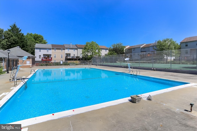 12001 Old Columbia Pike Unit 514, Silver Spring, MD 20904 - community pool featuring a residential view