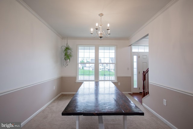 173 Tuscany Trl, Hedgesville, WV 25427 - dining area featuring a chandelier, ornamental molding, carpet, and baseboards