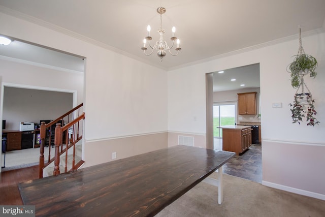 173 Tuscany Trl, Hedgesville, WV 25427 - unfurnished dining area featuring a chandelier, stairs, ornamental molding, baseboards, and wood finished floors