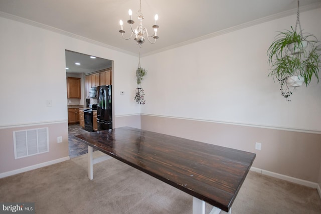 173 Tuscany Trl, Hedgesville, WV 25427 - unfurnished dining area featuring light carpet, a chandelier, crown molding, and baseboards