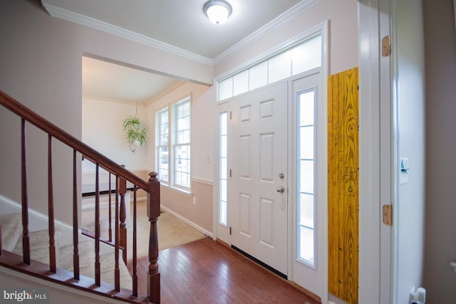 173 Tuscany Trl, Hedgesville, WV 25427 - entrance foyer with ornamental molding, stairs, hardwood / wood-style floors, and baseboards