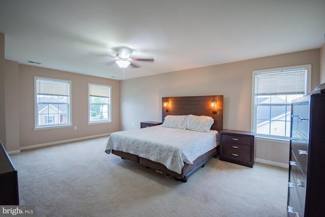 173 Tuscany Trl, Hedgesville, WV 25427 - bedroom with light carpet, baseboards, and a ceiling fan