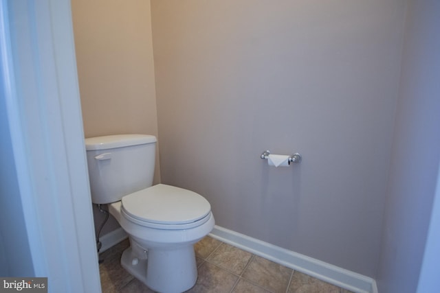 173 Tuscany Trl, Hedgesville, WV 25427 - bathroom featuring baseboards, toilet, and tile patterned floors