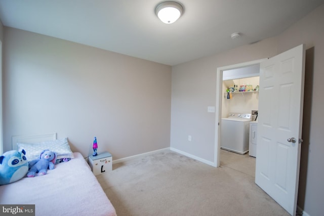 173 Tuscany Trl, Hedgesville, WV 25427 - unfurnished bedroom with independent washer and dryer, light colored carpet, and baseboards