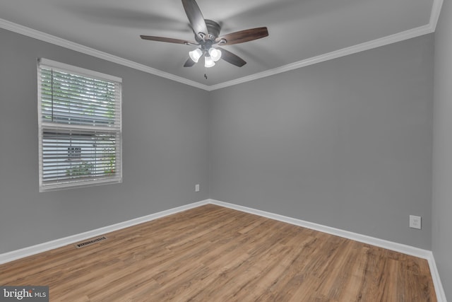 1223 Kendrick Rd, Baltimore, MD 21237 - unfurnished room featuring baseboards, wood finished floors, a ceiling fan, and ornamental molding