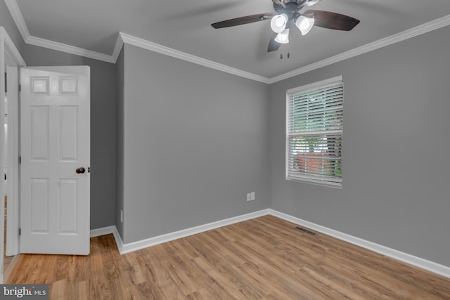 1223 Kendrick Rd, Baltimore, MD 21237 - spare room featuring ceiling fan, wood finished floors, baseboards, and ornamental molding